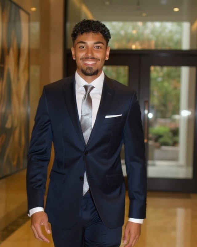 Kevin Reece, founder of Starhaven Technologies, in a navy suit.